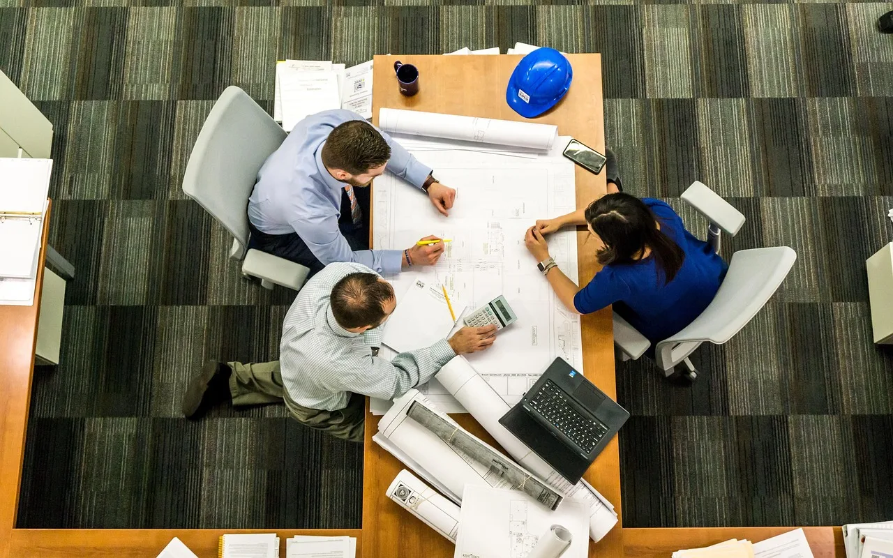 meeting, business, architect, office, team, plan, blueprints, teamwork, group, people, project, workplace, table, desk, meeting, meeting, meeting, business, business, business, business, business, architect, office, office, office, office, team, team, teamwork, project, workplace. SBA 7(a) vs 504 loan: Structure and fit