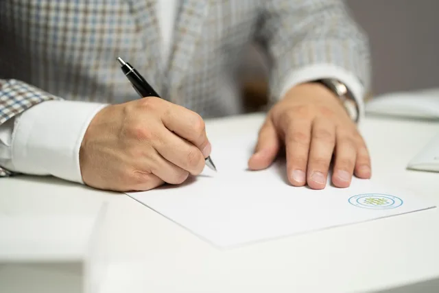 man, sign, paper, write, document, contract, signing, agreement, signature, signing document, signing contract, signing paper, sign, contract, contract, contract, contract, contract, signing, agreement, signature, signature. Small business loans in Canada: security, documents and timing